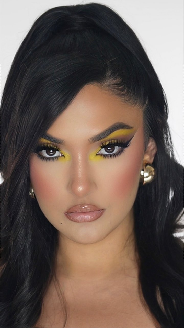 Bianca in a yellow cut-crease editorial look